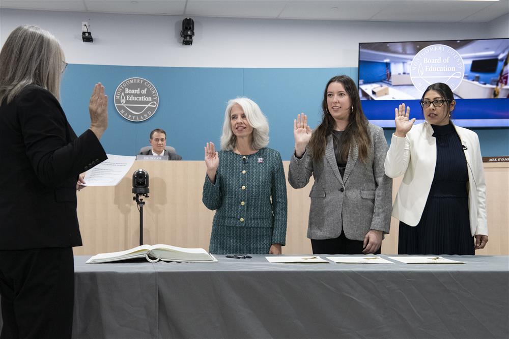 Montoya, Stewart, and Zimmerman being sworn in.